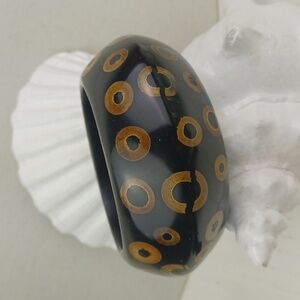 KJL Black Lucite & Golden Tan Bicone Knife Edge Stamped Bangle Bracelet